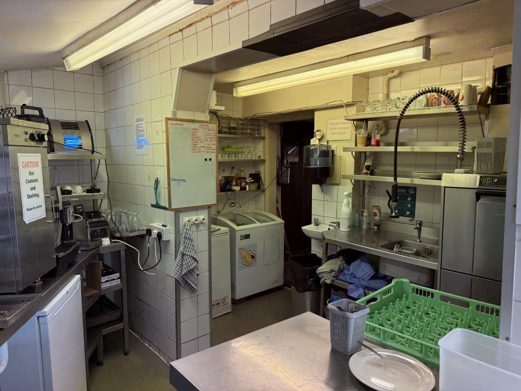 Lot: 30 - LANDMARK FREEHOLD TOWN CENTRE COMMERCIAL INVESTMENT - Looking Back into the Kitchen and Prep Area